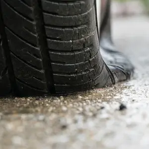 Close-up of a repaired tire tread at Concord Tires